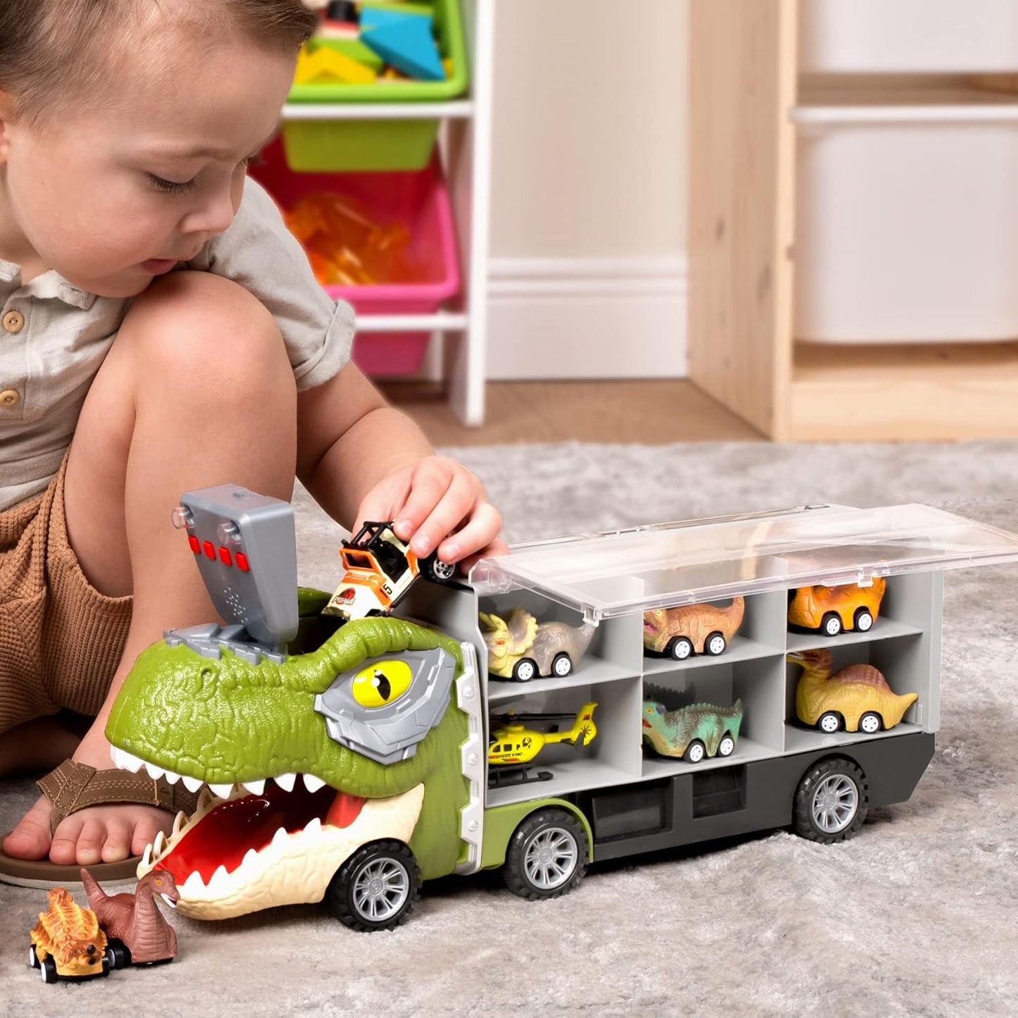 camión de dinosaurios con 12 autos de tracción hacia atrás