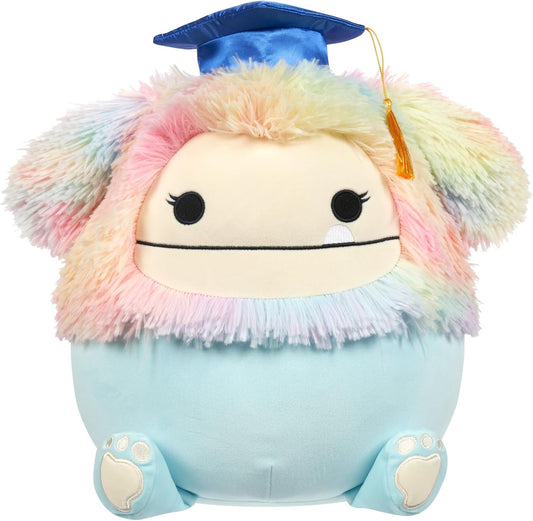 Squishmallows Original Zozo Blue Bigfoot de 12 pulgadas con melena arcoíris y gorra de graduación